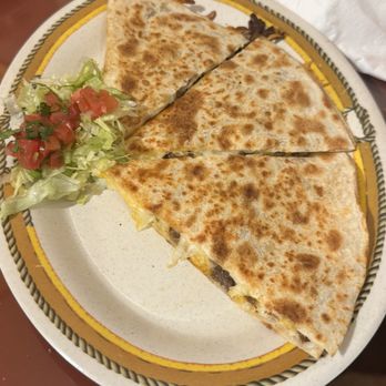 Don Nacho's Cafe - Quesadilla with carne asada (one piece missing) - Mexican Near Me - Solvang, California Don Nacho's Cafe - Quesadilla with carne asada (one piece missing) - Mexican Near Me - Solvang, California