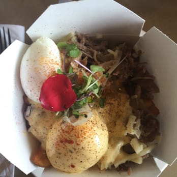 OEB Breakfast - Bridgeland - Duck confit breakfast box with medium eggs, amazingly juicy duck and golden potato wedges. - Breakfast & Brunch Near Me - Calgary, Alberta OEB Breakfast - Bridgeland - Duck confit breakfast box with medium eggs, amazingly juicy duck and golden potato wedges. - Breakfast & Brunch Near Me - Calgary, Alberta
