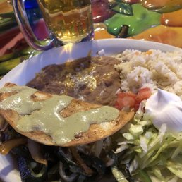 Poblano pepper quesadilla with shredded chicken, refried beans, rice & sour cream. Yummm Poblano pepper quesadilla with shredded chicken, refried beans, rice & sour cream. Yummm