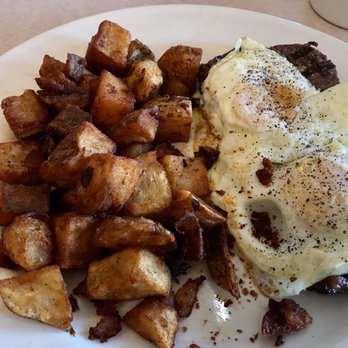 Majestic Diner - Steak and eggs over easy with home fries! Perfectly cooked. Nice piece of steak underneath. - Breakfast & Brunch Near Me - Ramsey, New Jersey