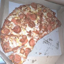 Round Table Pizza - Pepperoni pizza that looks pretty similar to a cheese pizza sold by Round table the most honestly skimping you on your toppings pizza!