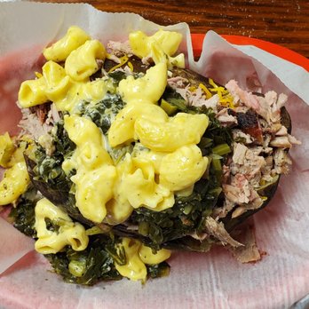 Woodpeckers Backyard BBQ - Loaded Tater (baked potato, pork, collard greens and mac n cheese) - Barbeque Near Me - Saint Augustine, Florida Woodpeckers Backyard BBQ - Loaded Tater (baked potato, pork, collard greens and mac n cheese) - Barbeque Near Me - Saint Augustine, Florida