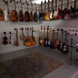 Pawn Plus - He has Good prices  on guitars.. he even gave me a guitar case free for showi just stopping by.