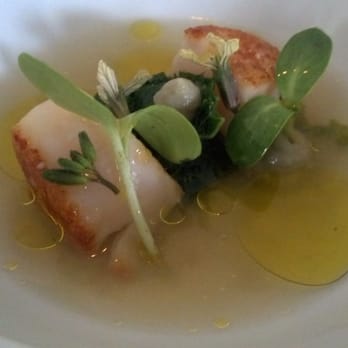 Commis - scallop with artichokes in a dashi made with mustard plant - New American Near Me - Oakland, California
