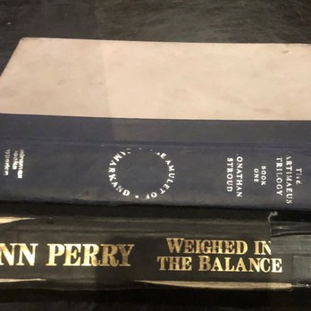 Mulleady's Irish Pub - Menus bound into old books? Someone's a clever lad or lass. - Irish Pub Near Me - Seattle, Washington