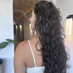 Salon Suites & Spa - Curly long layers https://www.anotherdimensionsalon.com/