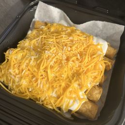 5 Beef Rolled Tacos with sour cream and cheese only