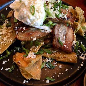 El Santo - chilaquiles with salsa verde, cotija cheese, pork belly confit and poached egg...delicious!! - Mexican Near Me - New Westminster, British Columbia El Santo - chilaquiles with salsa verde, cotija cheese, pork belly confit and poached egg...delicious!! - Mexican Near Me - New Westminster, British Columbia