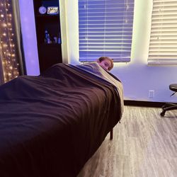 Sacred Space Massage and Bodywork - My 7 year old son about to get massaged by Ann.