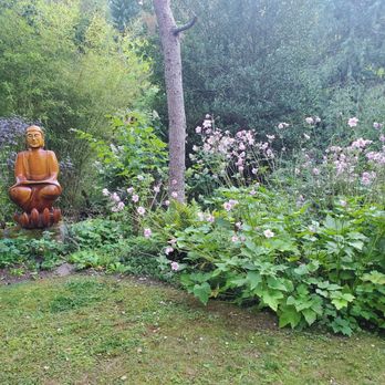 Molly Ward Gardens - A statue out in the garden. - New American Near Me - Poulsbo, Washington Molly Ward Gardens - A statue out in the garden. - New American Near Me - Poulsbo, Washington