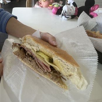 1928 Cuban Bistro - Fleming Island - The Cuban.  Pork, ham, Swiss cheese, pickles, & dijon mustard on Cuban bread. - Coffee & Tea Near Me - Fleming Island, Florida