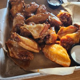 Wings. Honey Garlic, habenero,  Buffalo ranch and jalapeno