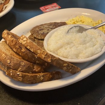Nick's Family Diner - One 1 Egg Any Style with Sausage (turkey) and great grits! - Diners Near Me - Orlando, Florida