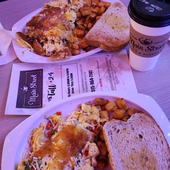 Main Street Cafe & Bakery - Top Chicken Bacon Waffle (wanted more Maple aioli), lower is Hawaiian (salsa is spicy but good).  Multigrain bread and potatoes. - Cafes Near Me - Ankeny, Iowa