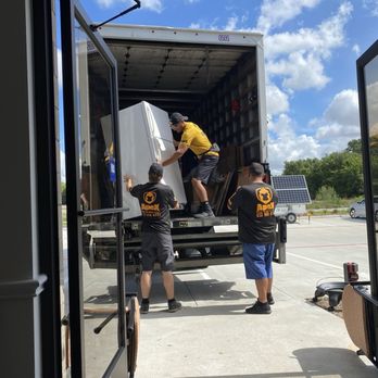ApeX Moving And Delivery Services - Movers offloading a fridge - Movers Near Me