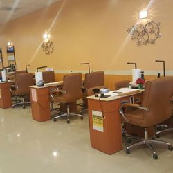 Kim's Hair and Nails - Modern and Comfortable manicure Tables Equipped with any nail needs