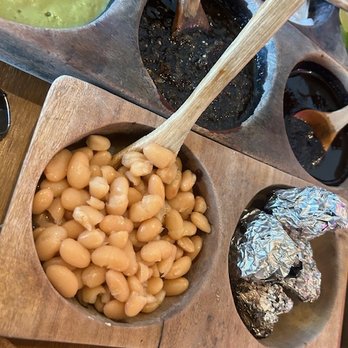 El Itacate - The side beans and grilled onions are tasty! - Tacos Near Me - Sayulita, NAY