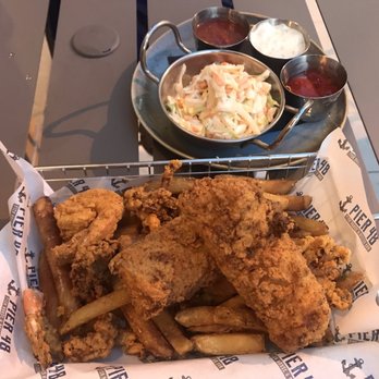 Pier 48 - Deep fried fish platter comes with sauces, coleslaw, and fries. - Seafood Near Me - Indianapolis, Indiana Pier 48 - Deep fried fish platter comes with sauces, coleslaw, and fries. - Seafood Near Me - Indianapolis, Indiana