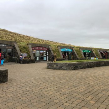 Cliffs of Moher - The visitors center (and gift shops) are built into a hill. - Local Flavor Near Me - Liscannor, CE Cliffs of Moher - The visitors center (and gift shops) are built into a hill. - Local Flavor Near Me - Liscannor, CE
