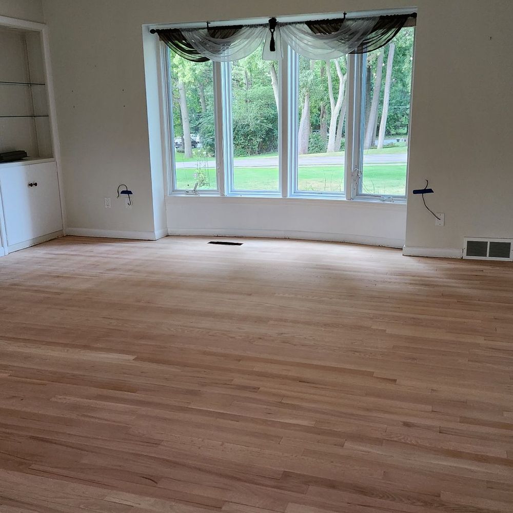 Exotic Flooring & Designs - Sanding removing ripples in old flooring - Flooring Near Me - Bloomfield Hills, Michigan