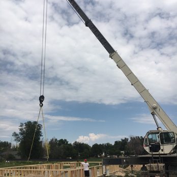Kran - Setting support steel for a historical home restoration .  Using the Crossover 4500 - Crane Services Near Me - Greeley, Colorado