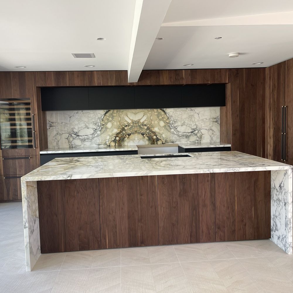 Kitchen island, counter tops, back splash.