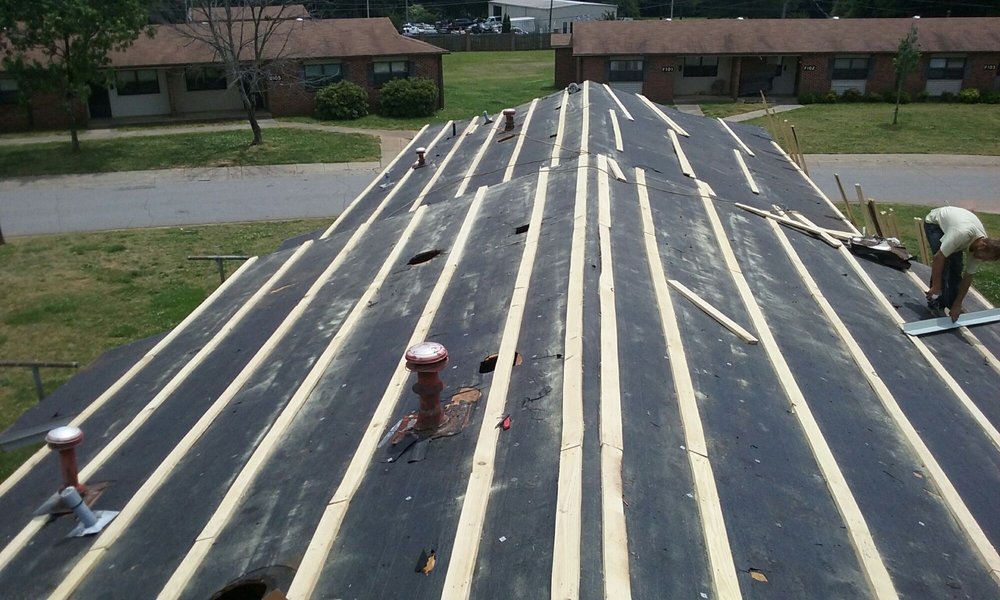 Slide of Tim's Roofing