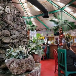 Water fall in the center of dining room.