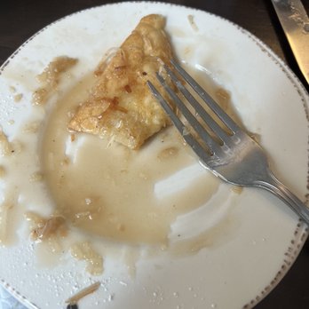 Syrup Downtown - Coconut French toast (mostly eaten). - Breakfast & Brunch Near Me - Denver, Colorado