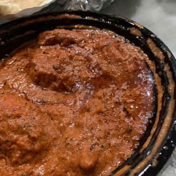 Spice and Beyond - a plate of food on a table - Halal Near Me - Latham, New York