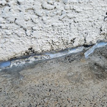 OC Concrete Stain - Caulk removed/damaged by grinders. - Masonry/Concrete Near Me