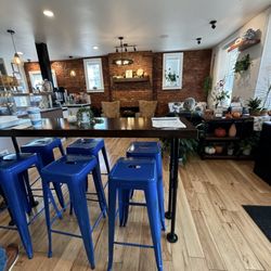 Athena Kafenio - High top seating as well as seats and couches by fire place
