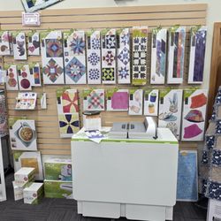 Quality Sewing & Vacuum - Make cutting out your pieces for your quilt fast and easy with an Accuquilt cutting system
