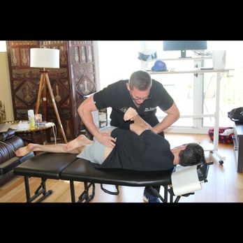 Telfair Chiropractic - Performing lumbar spine chiropractic manipulation. - Chiropractors Near Me - Sarasota, Florida