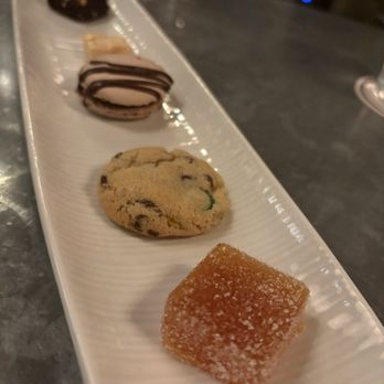 Signature Restaurant - Petit fours (brownie, dulce de leche, macaron, chocolate chip cookie, and a citrus gel?) - New American Near Me - San Antonio, Texas Signature Restaurant - Petit fours (brownie, dulce de leche, macaron, chocolate chip cookie, and a citrus gel?) - New American Near Me - San Antonio, Texas