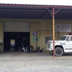 J & S Tire Center - Bay doors and office from street