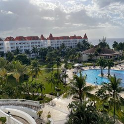 Grand Bahia Principe - Picture of the pool deck on Grand side. Beautiful with great landscaping.