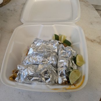 Yeah Yeah Taco - 4 tacos wrapped up and lime wedges - Mexican Near Me - Minneapolis, Minnesota