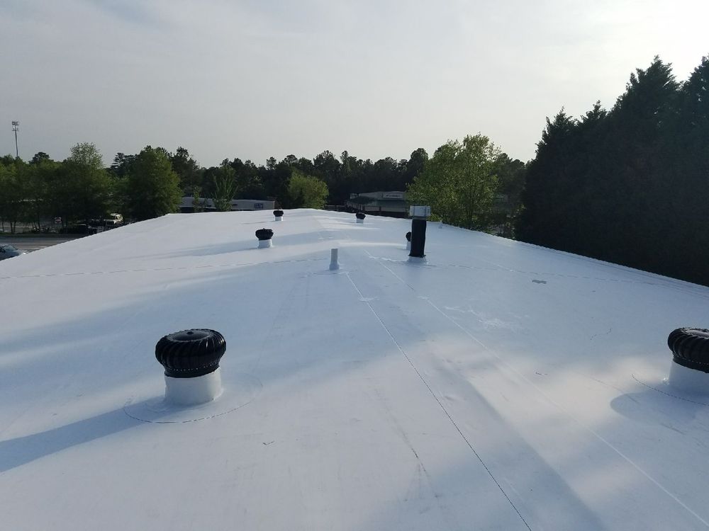 Slide of Ben Roofing