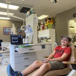 Rocket City Kids - Exam area, TVs for kids on ceilings and the Dr. asks them what they want to watch!