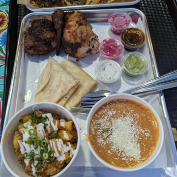 Saucy Chick Indi-Mex Eatery - Jeera Rotisserie Chicken. Sides: Mom's Beans, Papas con Chorizo. Sauces: GG sauce, Ambli molasses, Raita. - Indian Near Me - Pasadena, California Saucy Chick Indi-Mex Eatery - Jeera Rotisserie Chicken. Sides: Mom's Beans, Papas con Chorizo. Sauces: GG sauce, Ambli molasses, Raita. - Indian Near Me - Pasadena, California