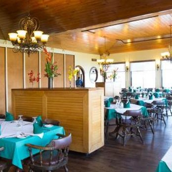 California Scuba Center - Sunset House Grand Caymans - Dive Shops Near Me - Clovis, California