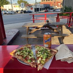 Automatic Pizza - Pineapple, jalapeño, broccoli, pepperoni, cheese pizza slices and orange Sunkist.