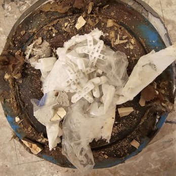 Western States Flooring - Garbage shoved down two sewer drains - Flooring Near Me - Chandler, Arizona