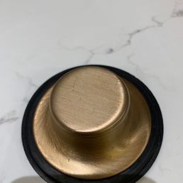 A brand new California Faucets sink plug, completely scratched by steel wool used by Lety's cleaners! A brand new California Faucets sink plug, completely scratched by steel wool used by Lety's cleaners!