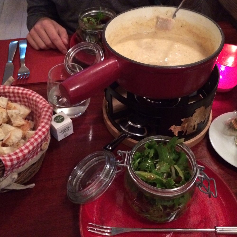 Fondue served with salad
