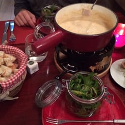 Fondue served with salad