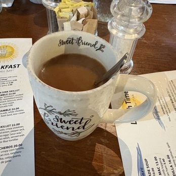 Petit Soleil - Coffee in one of their many silly and cute mugs. Each is different. Strong, smooth roast. - Breakfast & Brunch Near Me - Napa, California Petit Soleil - Coffee in one of their many silly and cute mugs. Each is different. Strong, smooth roast. - Breakfast & Brunch Near Me - Napa, California