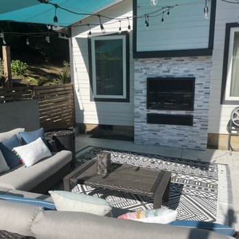 Cooper Mountain Masonry - After photo of the outside of the indoor outdoor fireplace - Masonry/Concrete Near Me Cooper Mountain Masonry - After photo of the outside of the indoor outdoor fireplace - Masonry/Concrete Near Me