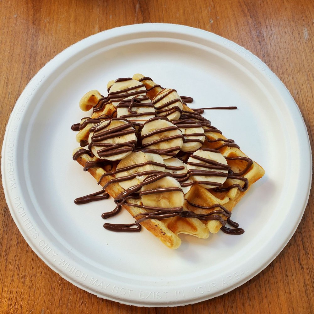 Nutella Cafe - Waffle with Nutella and Bananas - Desserts Near Me - Chicago, Illinois Nutella Cafe - Waffle with Nutella and Bananas - Desserts Near Me - Chicago, Illinois